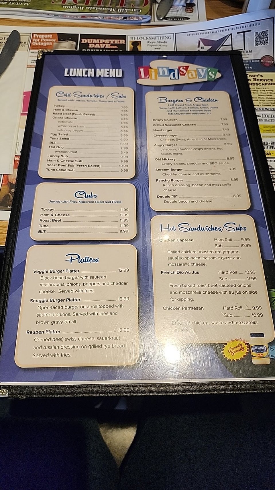 Lunch menu featuring sandwiches, soups, and wraps.